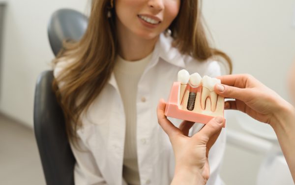 Seattle oral surgeon discussing dental implants
